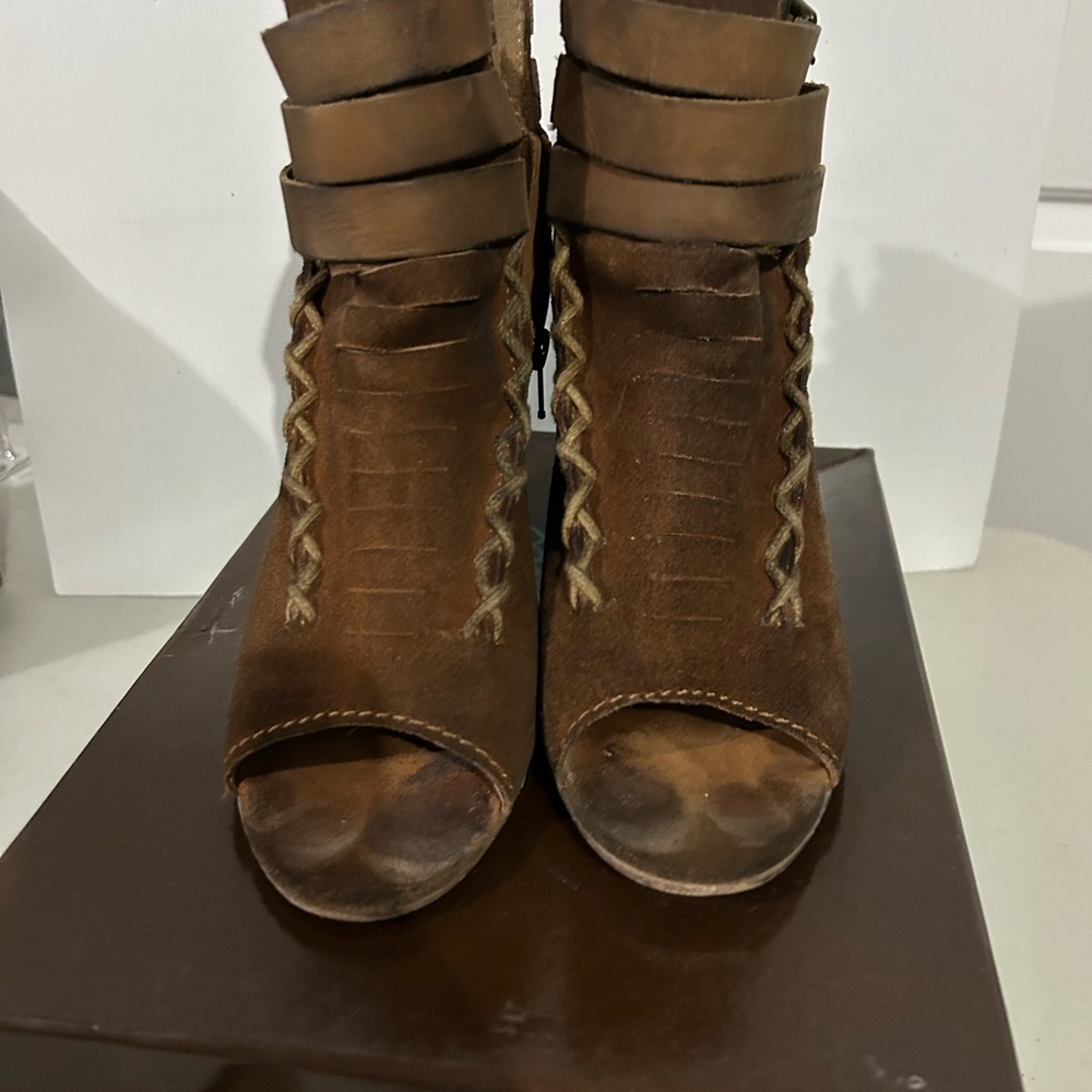 Elegant Brown Heeled Boots with Strap Detail
